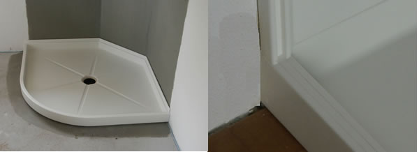 Duschwanne mit Detail der Ganzglasduschwand